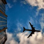 picture of plane flying in clouds