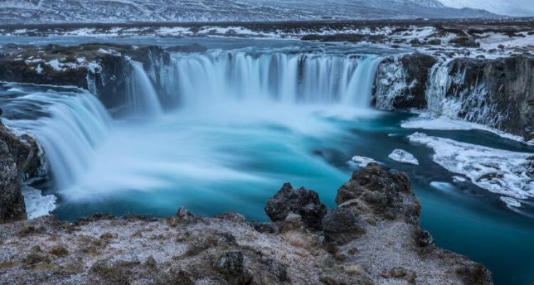 iceland waterfall aurora