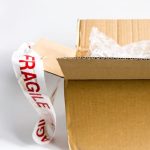 Want Your Luggage Fast? Stick a “Fragile” Label On It