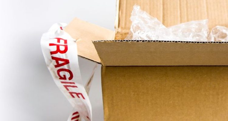 Want Your Luggage Fast? Stick a “Fragile” Label On It