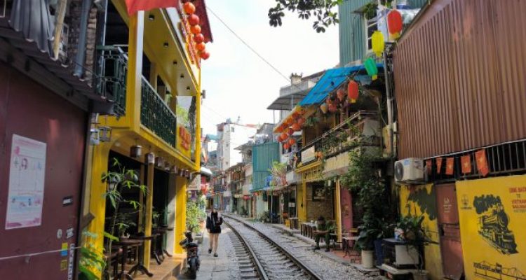 Tourist's Phone Gets Hit by Train While Filming at Hanoi Train Street